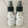 2 bottles of pillow spray on a marble background