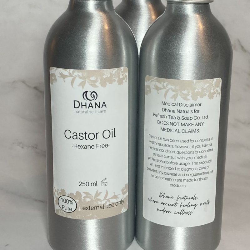 bottles of castor oil showing the front and back labels. In aluminum bottles. Reads Castor Oil - Hexane Free - 250 ml - 100% Pure for external use only