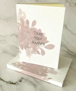 Trust Your Journey journal on marble backdrop