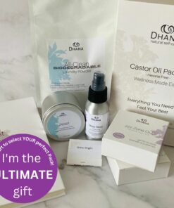 Ultimate Self-Care Gift from Dhana Self-Care (a collection of candles, soaps, journal, castor oil pack, pillow spray, laurndry) on a marble background