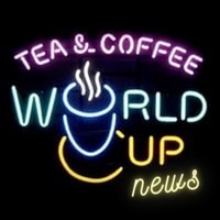 Neon lights read: Tea & Coffee World Cup News