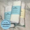 dhana self-care compress (three in a pile) on a marble counter